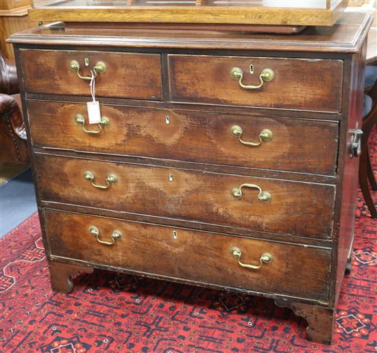 A George III mahogany chest, fitted two short and three long drawers, on bracket feet W.105cm